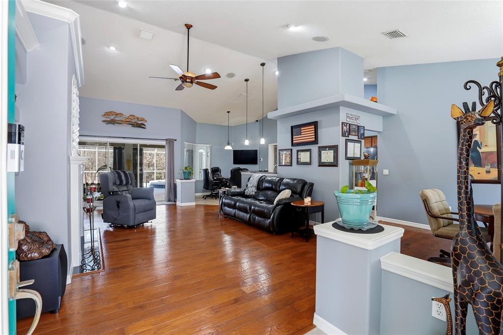 296 North Quartz Avenue Hernando, FL 34442 - Photo 10 of 66 a living room with furniture or kitchen and a wooden floor