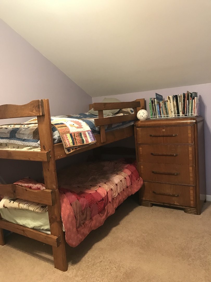 24562 Esmond Road Malta, IL 60150 - Photo 17 of 29 a bedroom with a bed and a night stand