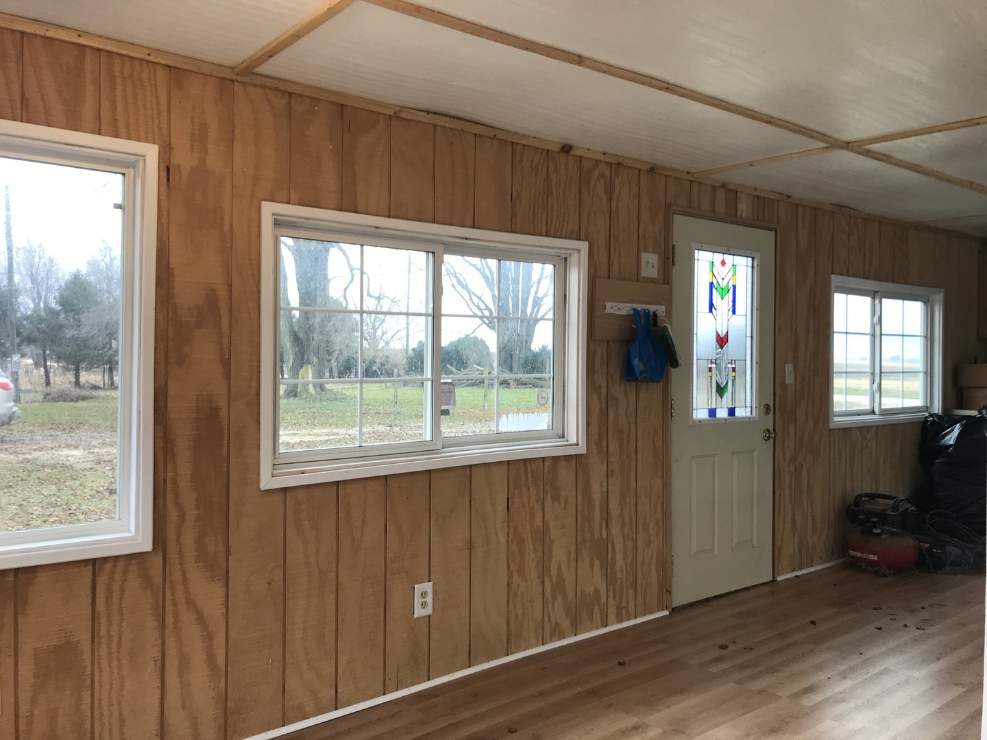 24562 Esmond Road Malta, IL 60150 - Photo 20 of 29 a view of an empty room with wooden floor and a window
