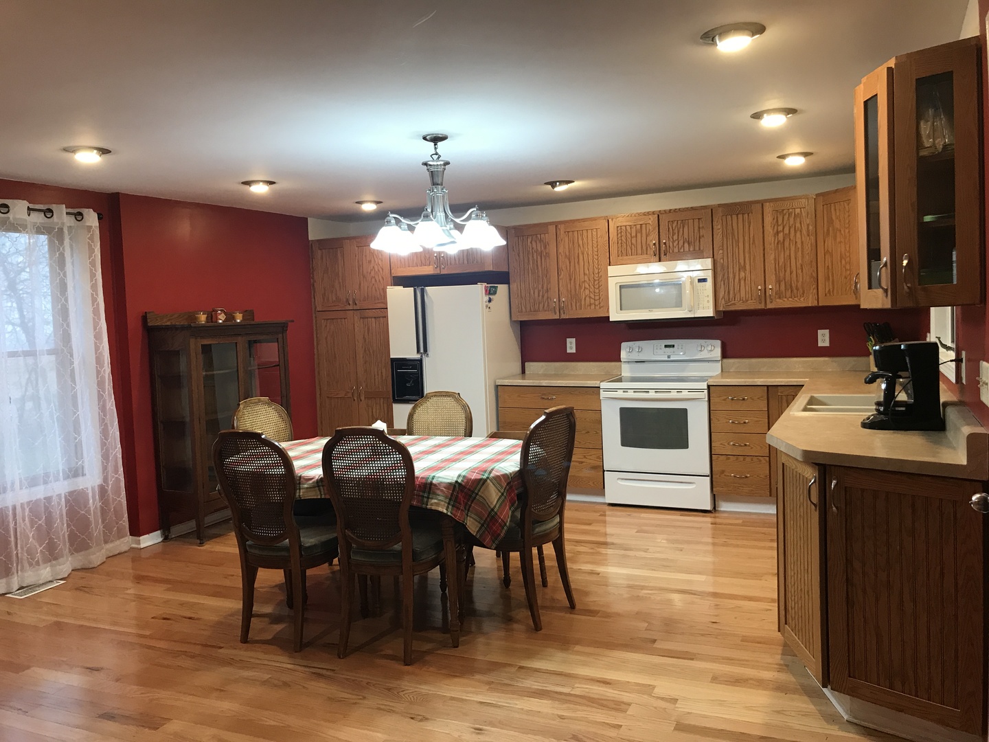 24562 Esmond Road Malta, IL 60150 - Photo 7 of 29 a view of a dining room with furniture and chandelier