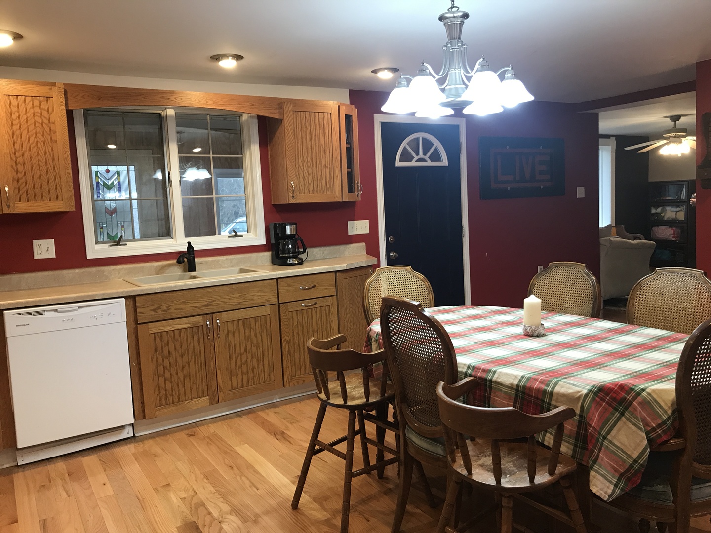 24562 Esmond Road Malta, IL 60150 - Photo 9 of 29 a view of a dining room with furniture and chandelier