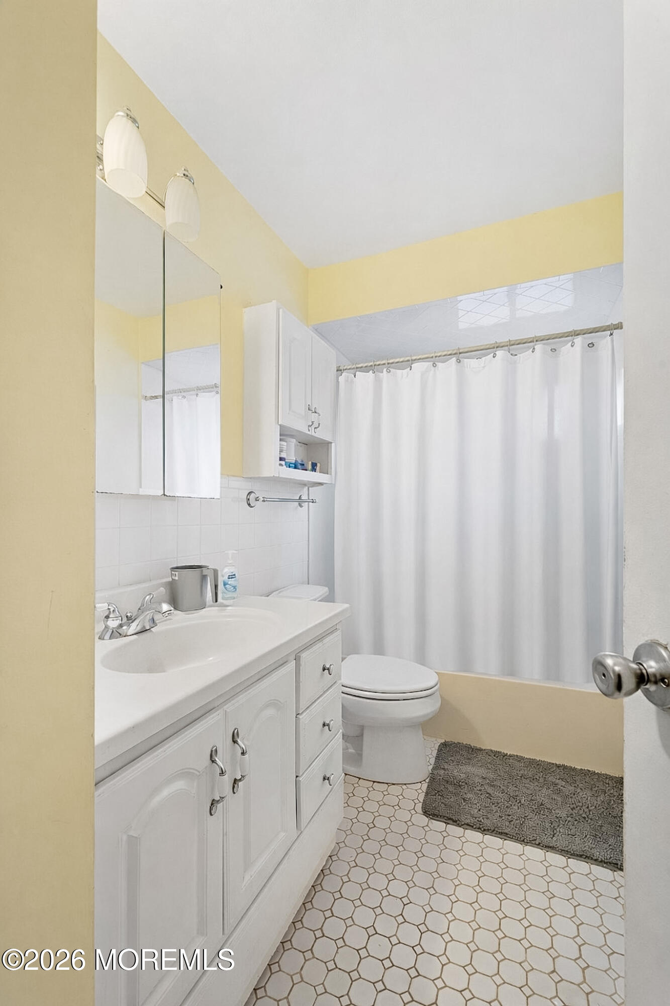 9 Neal Street Jackson, NJ 08527 - Photo 15 of 35 a bathroom with a granite countertop sink a toilet and a mirror