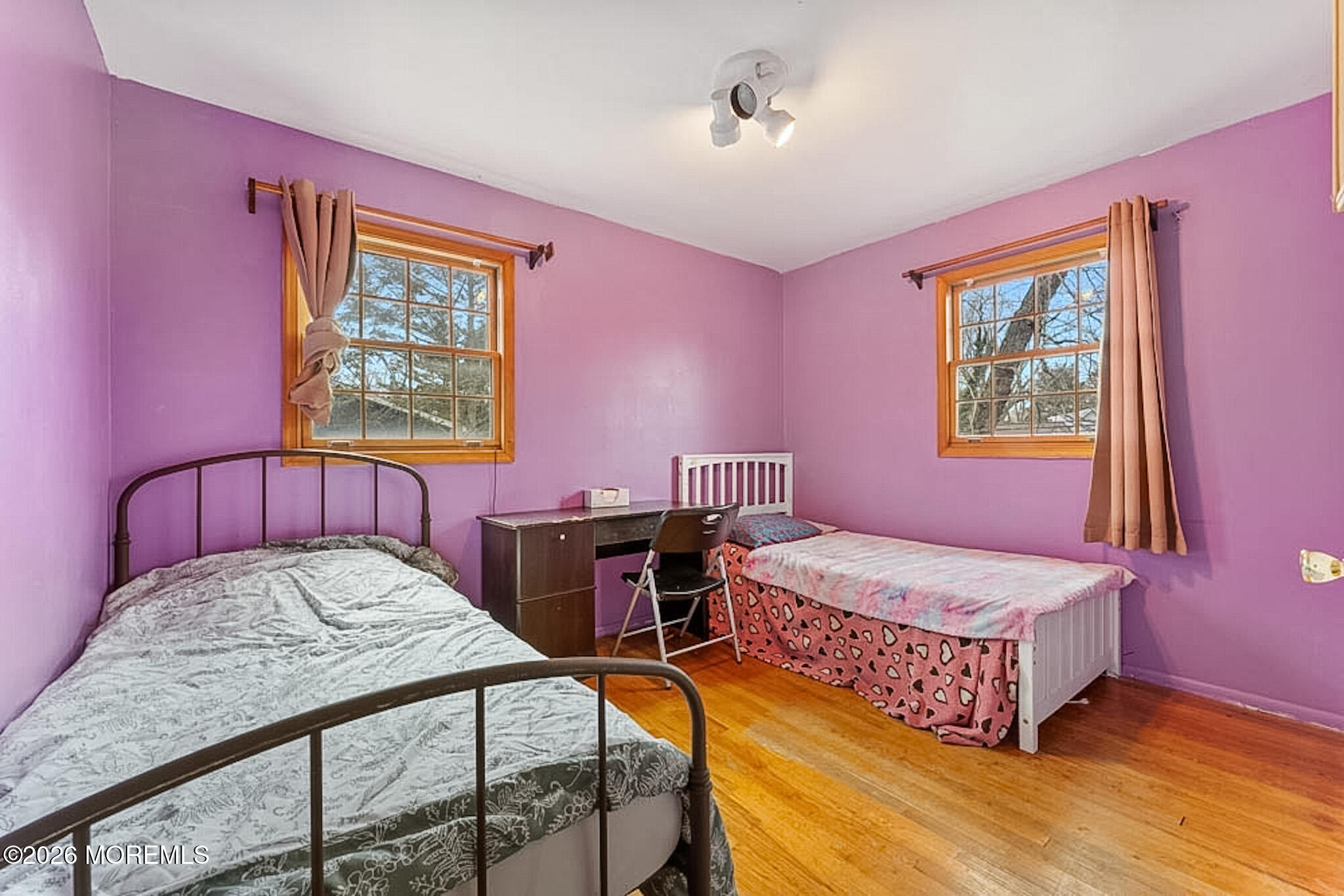 9 Neal Street Jackson, NJ 08527 - Photo 17 of 35 a bedroom with a bed and a table in it