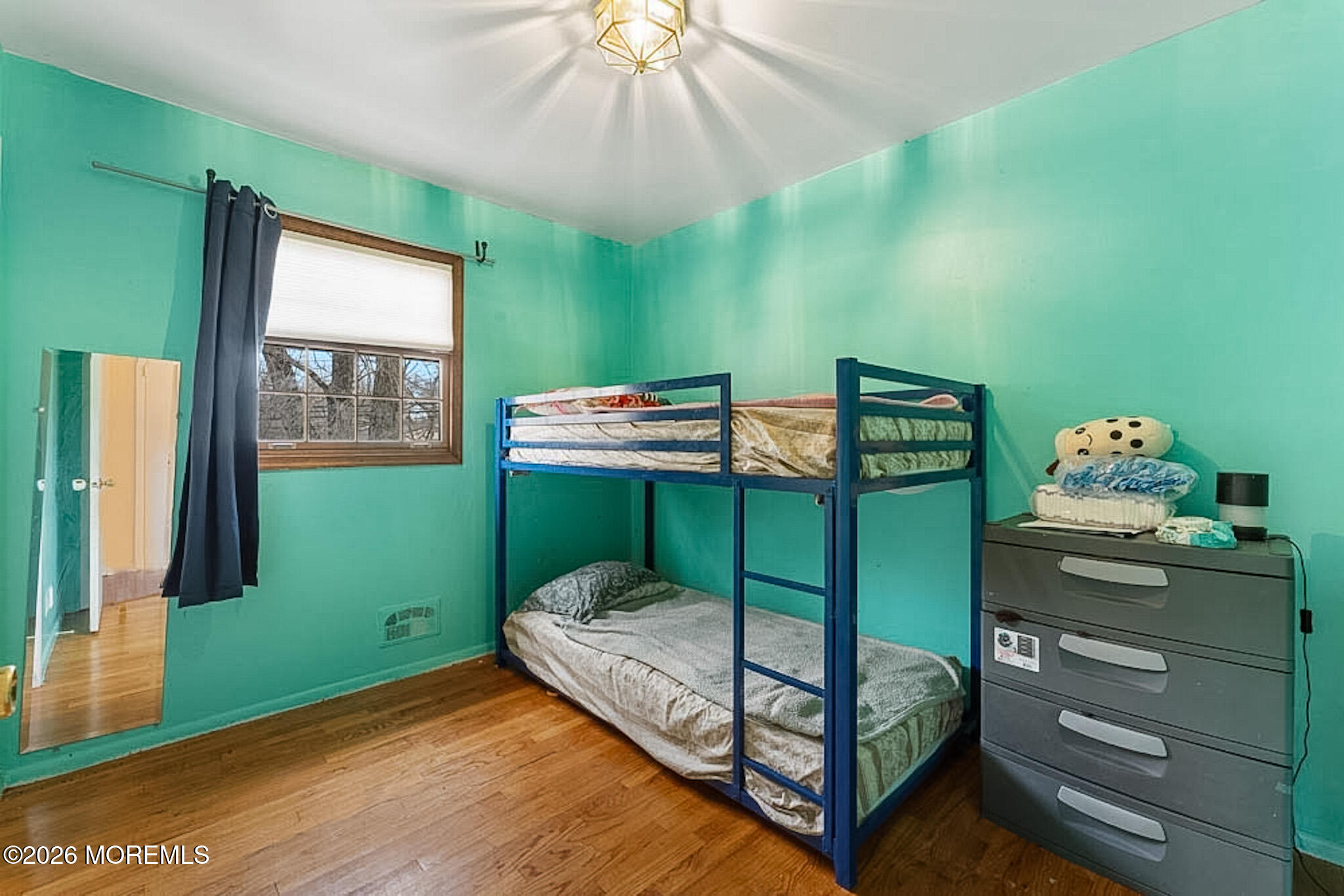 9 Neal Street Jackson, NJ 08527 - Photo 18 of 35 a bedroom with a bed and a dresser