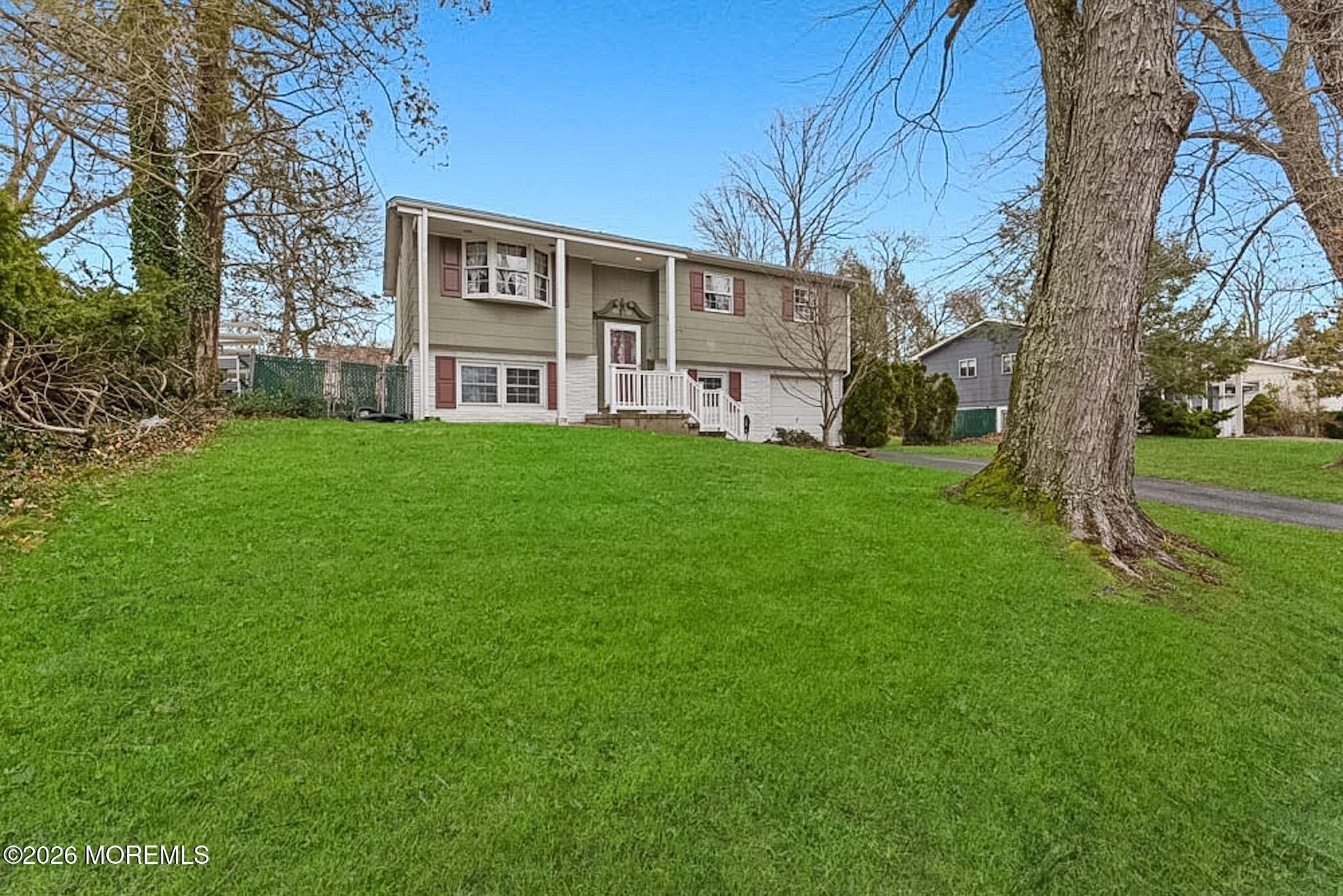 9 Neal Street Jackson, NJ 08527 - Photo 2 of 35 a view of a yard in front of house