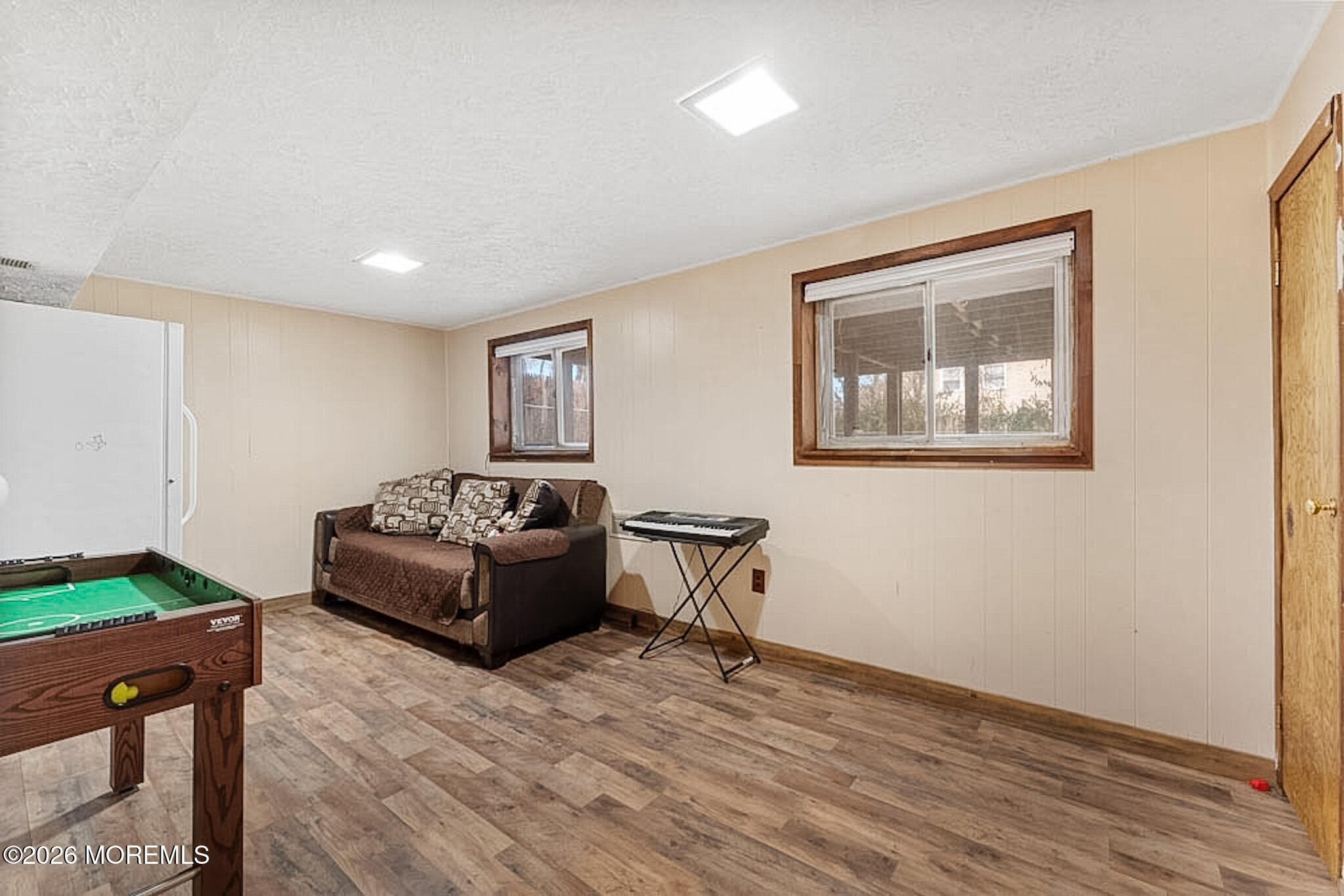 9 Neal Street Jackson, NJ 08527 - Photo 22 of 35 a living room with a couch and a table