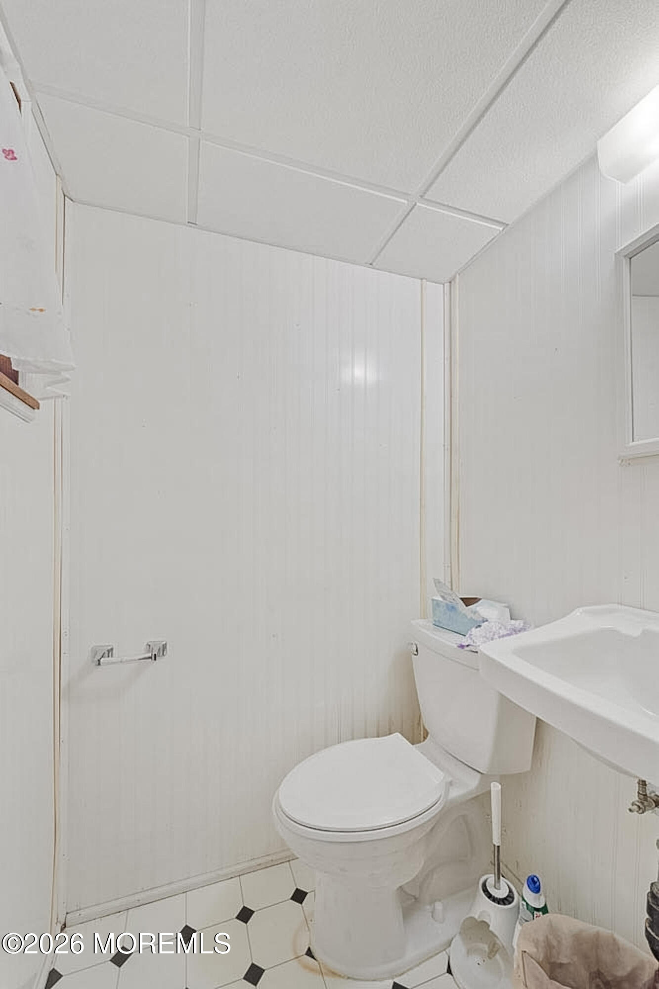 9 Neal Street Jackson, NJ 08527 - Photo 23 of 35 a white toilet sitting next to a bathroom sink