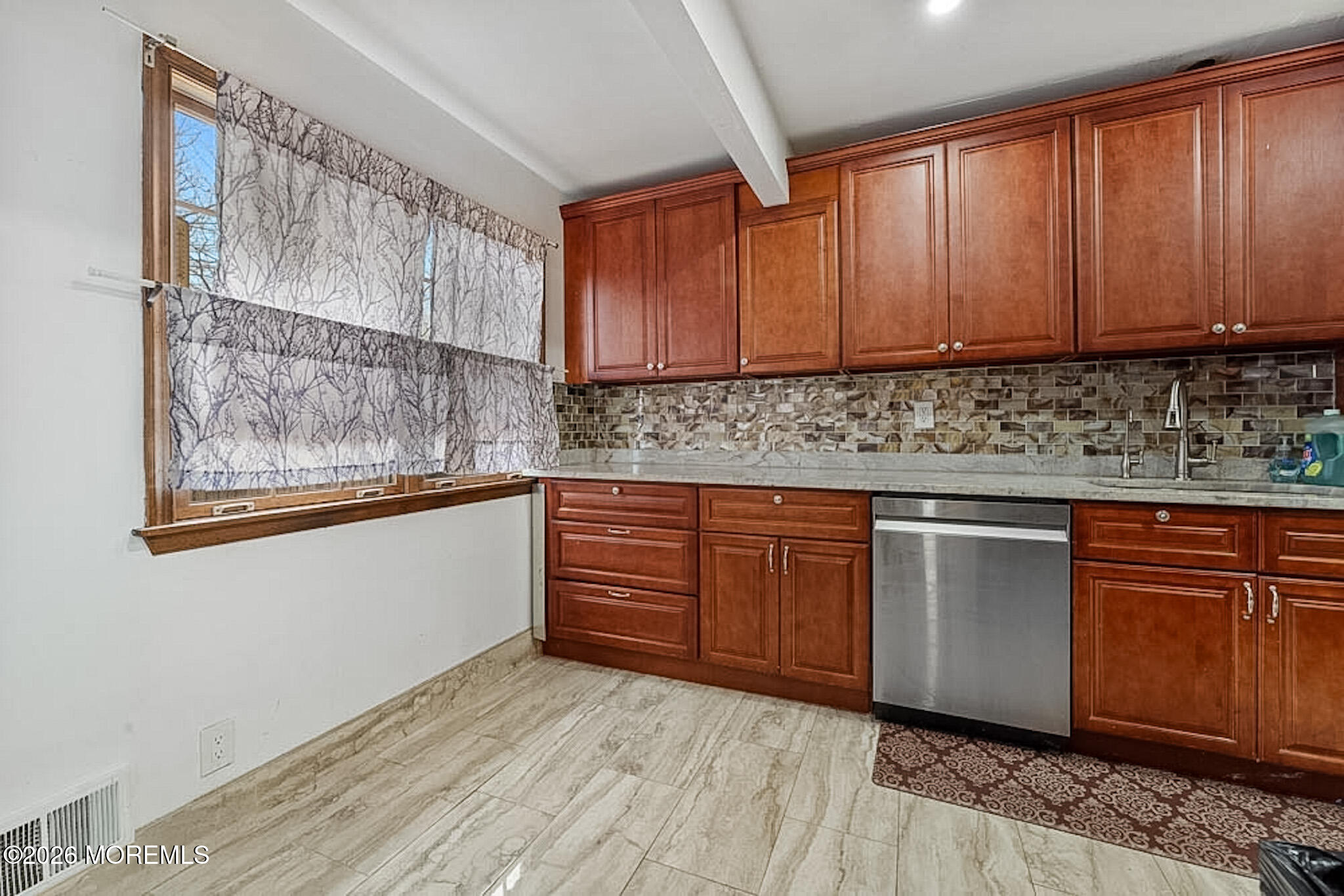 9 Neal Street Jackson, NJ 08527 - Photo 10 of 35 a kitchen with granite countertop wooden cabinets a sink and dishwasher