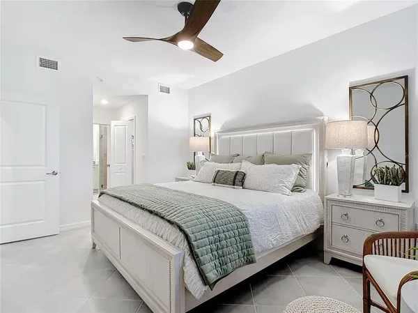 a bathroom with a double vanity sink and mirror