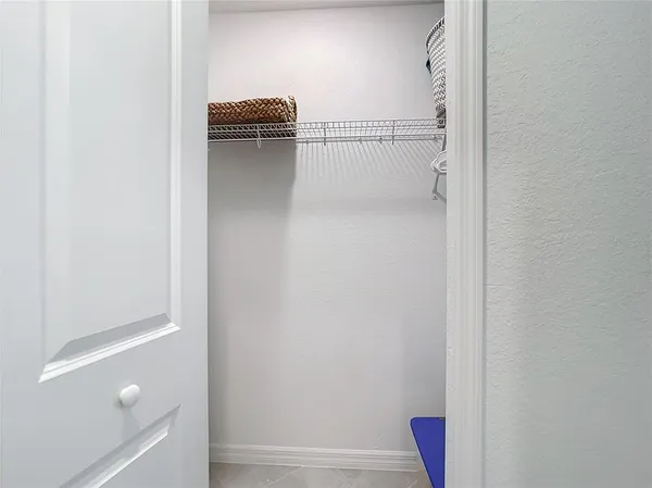 a bathroom with a shower sink and mirror