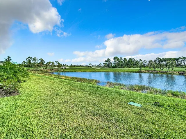 a view of a city with a lake