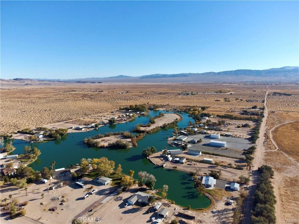 34232 Maui Road Newberry Springs, CA 92365 - Photo 24 of 35 an aerial view of ocean and residential houses with outdoor space