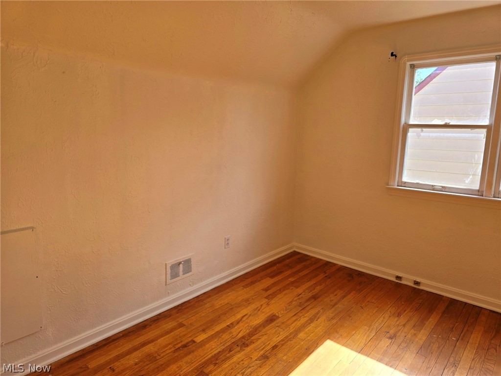 4111 Redfern Road Parma, OH 44134 - Photo 20 of 40 Second floor bedroom featuring hardwood flooring and lofted ceiling