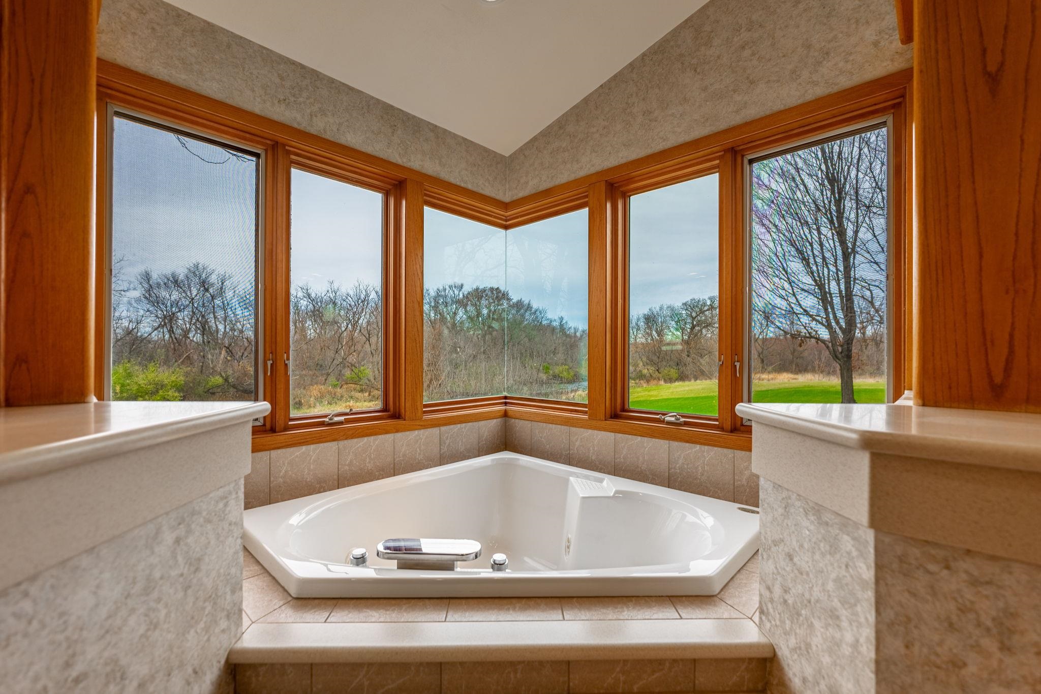 8634 North Kilbuck Road Monroe Center, IL 61052 - Photo 24 of 50 a view of bath tub sitting in a bathroom