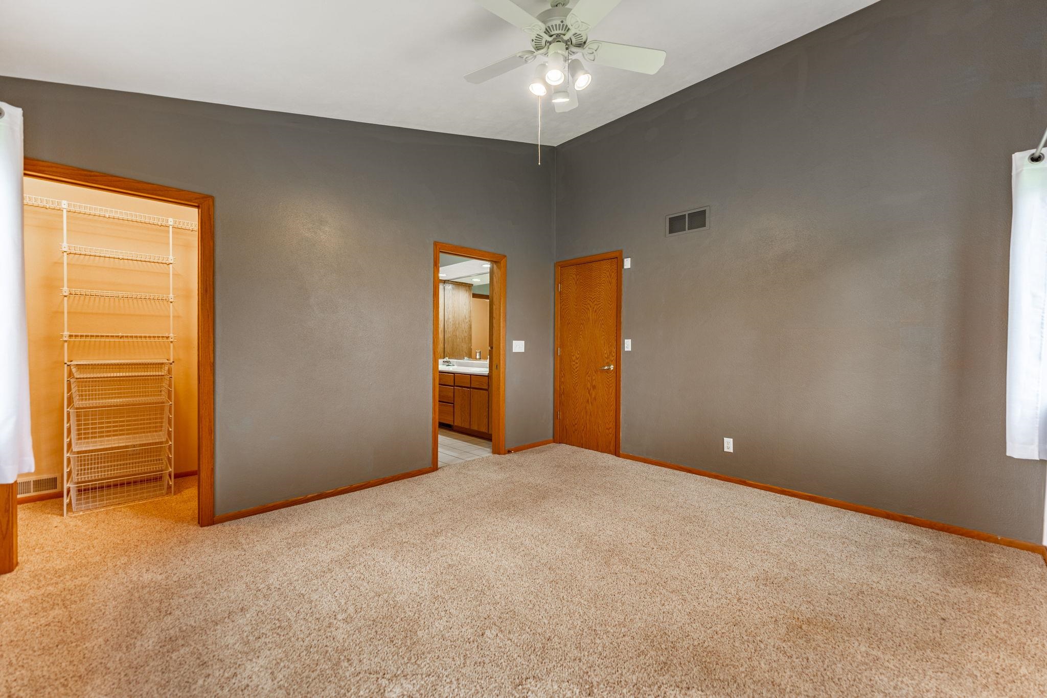 8634 North Kilbuck Road Monroe Center, IL 61052 - Photo 27 of 50 a view of an empty room with a window