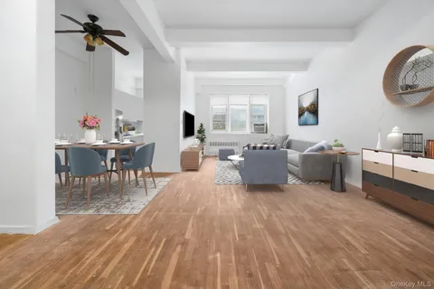 a living room with furniture and a window