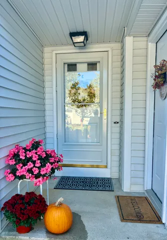 a bathroom with a granite countertop tub and sink