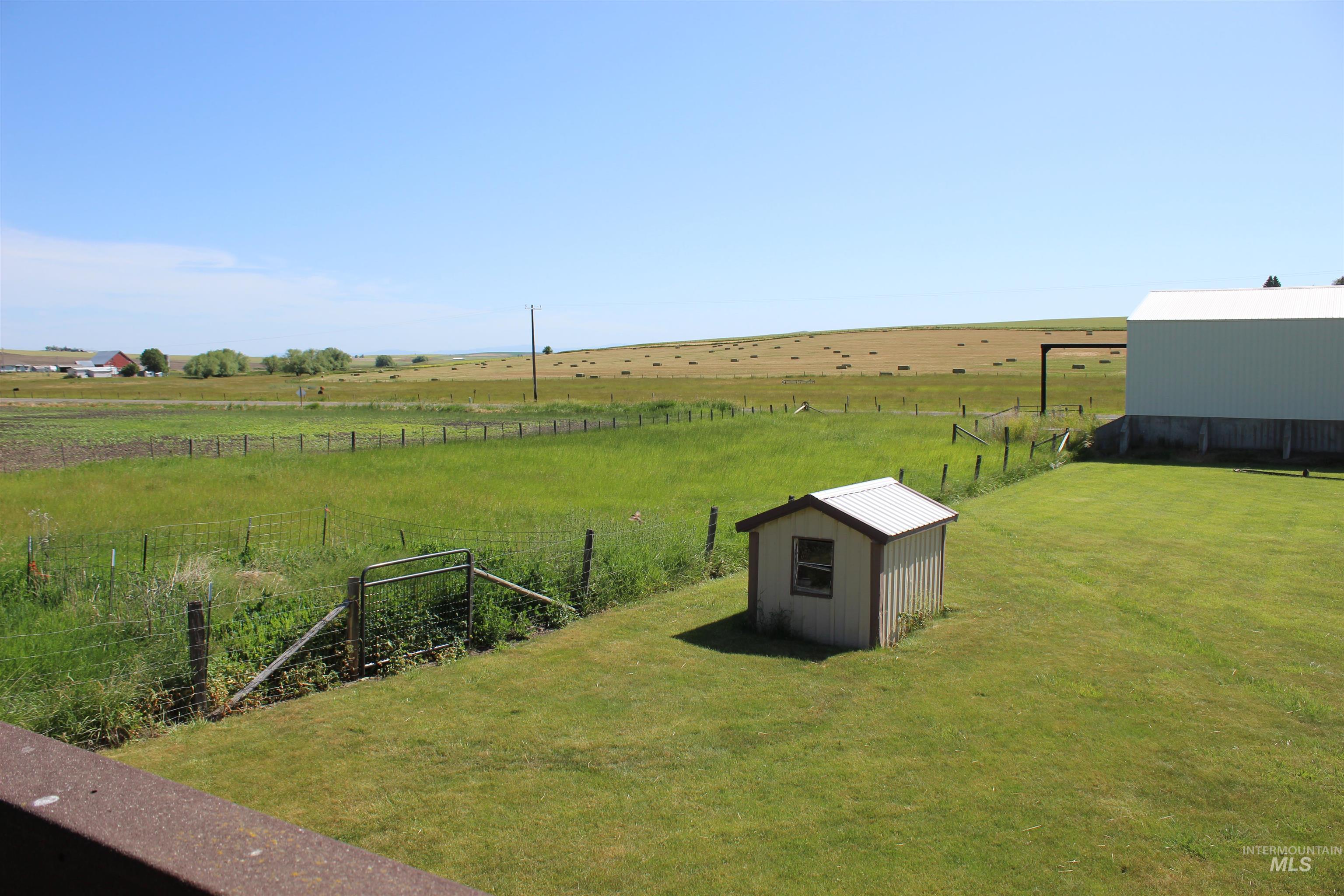 1034 Greencreek Road Greencreek, ID 83533 - Photo 11 of 42 View of yard with a rural view and a storage unit