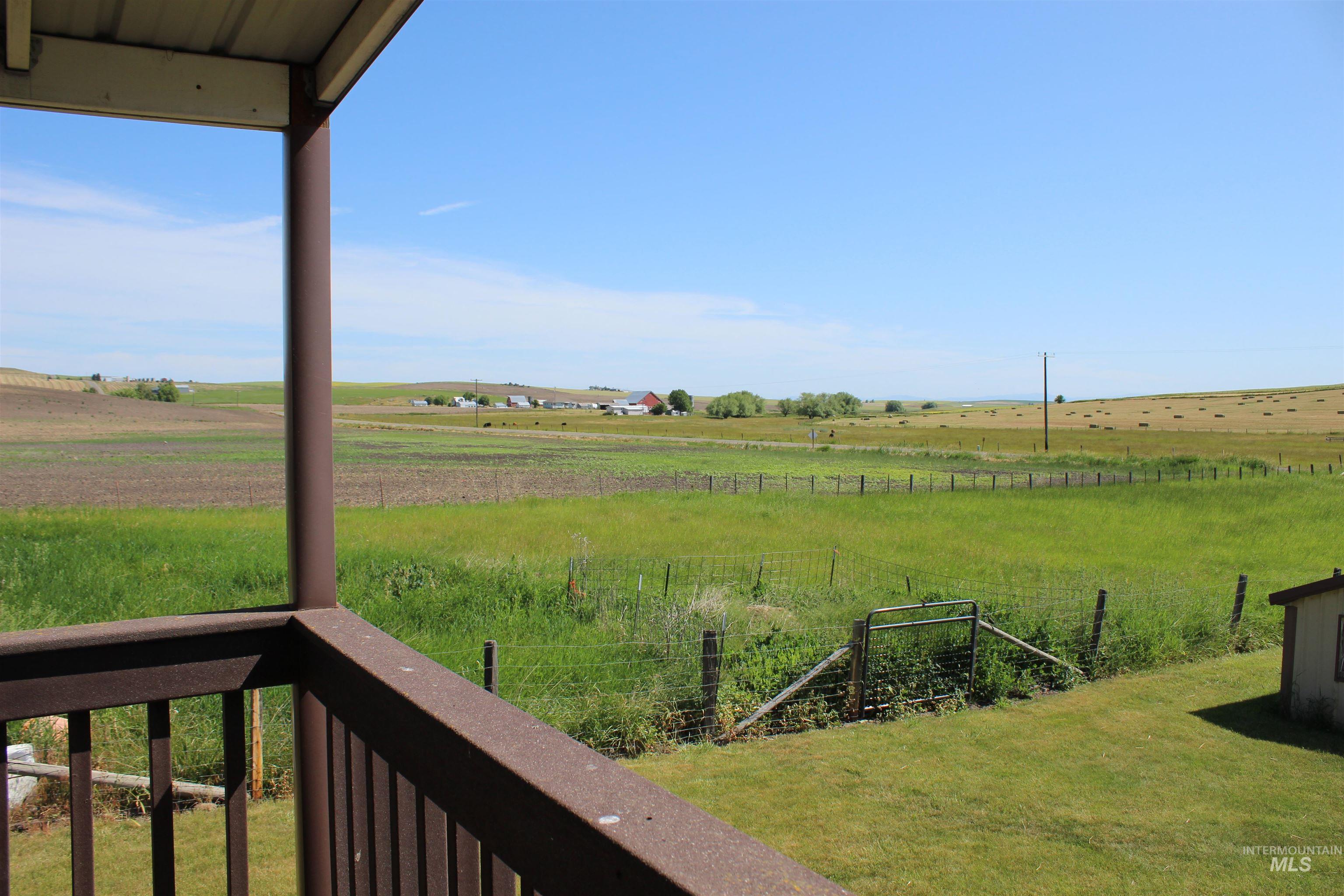 1034 Greencreek Road Greencreek, ID 83533 - Photo 15 of 42 View of yard with a view of rural / pastoral area and a balcony