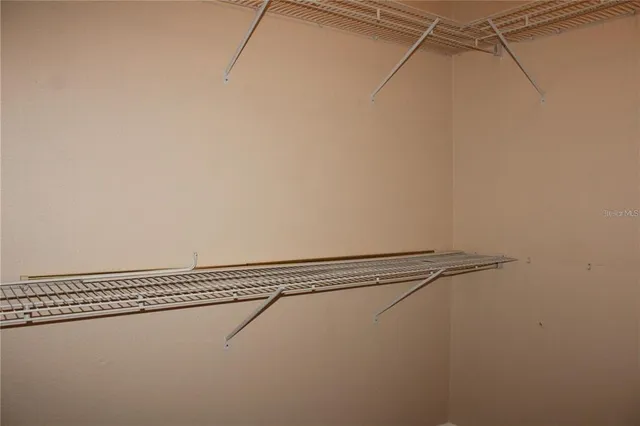 a view of a room with racks on the wall