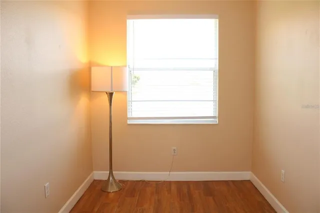 a view of a room that has a window in it
