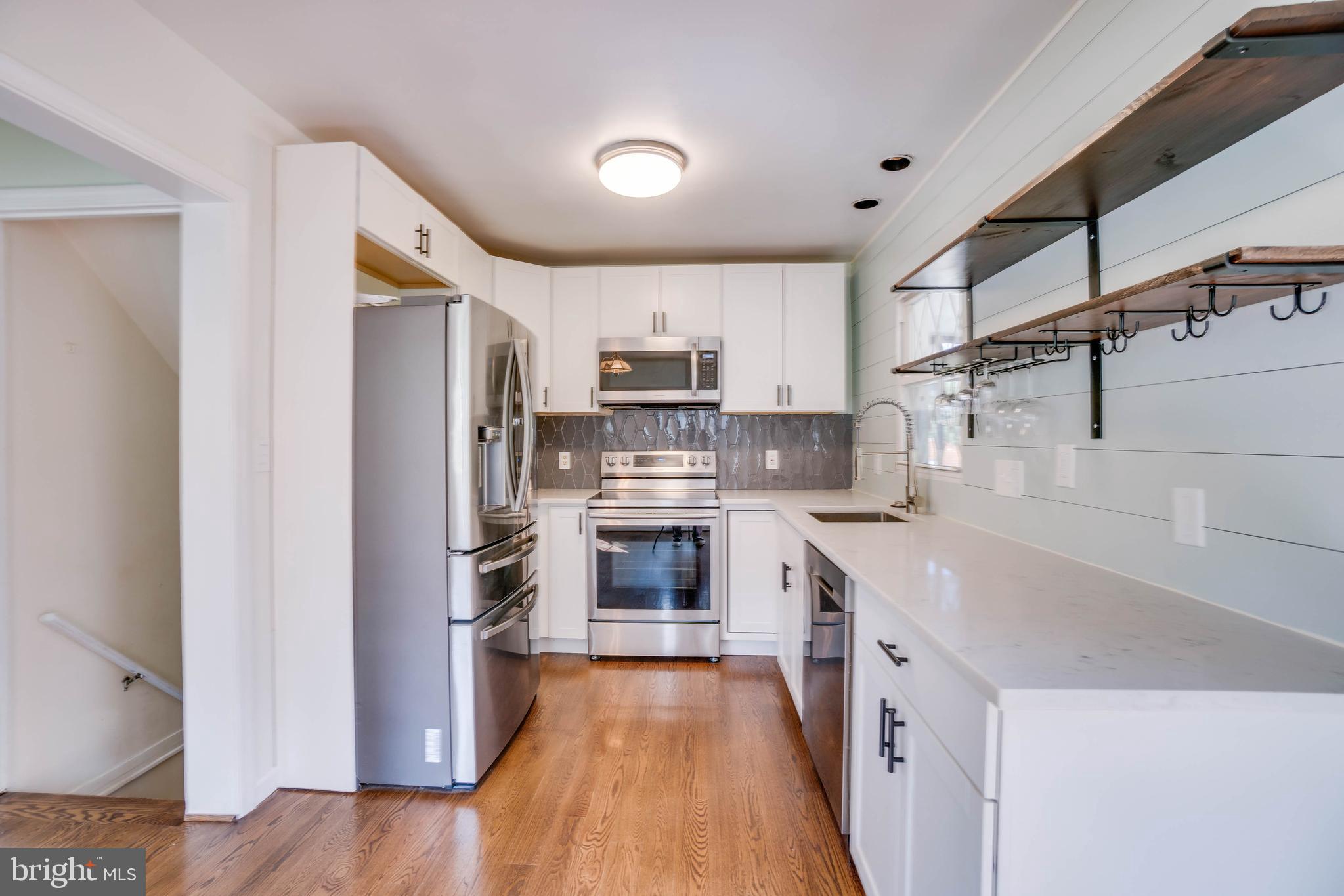 3201 Plyers Mill Road Kensington, MD 20895 - Photo 8 of 40 Brand new white cabinet kitchen w/ stainless steel