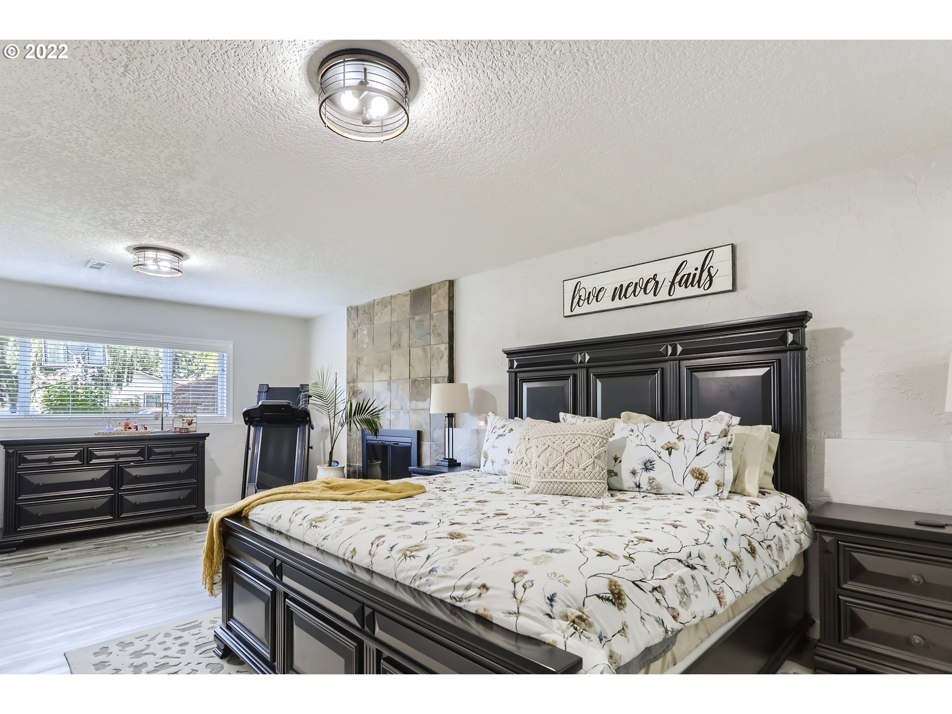 490 Southwest 4th Street Gresham, OR 97080 - Photo 17 of 30 a bedroom with a bed and a dresser