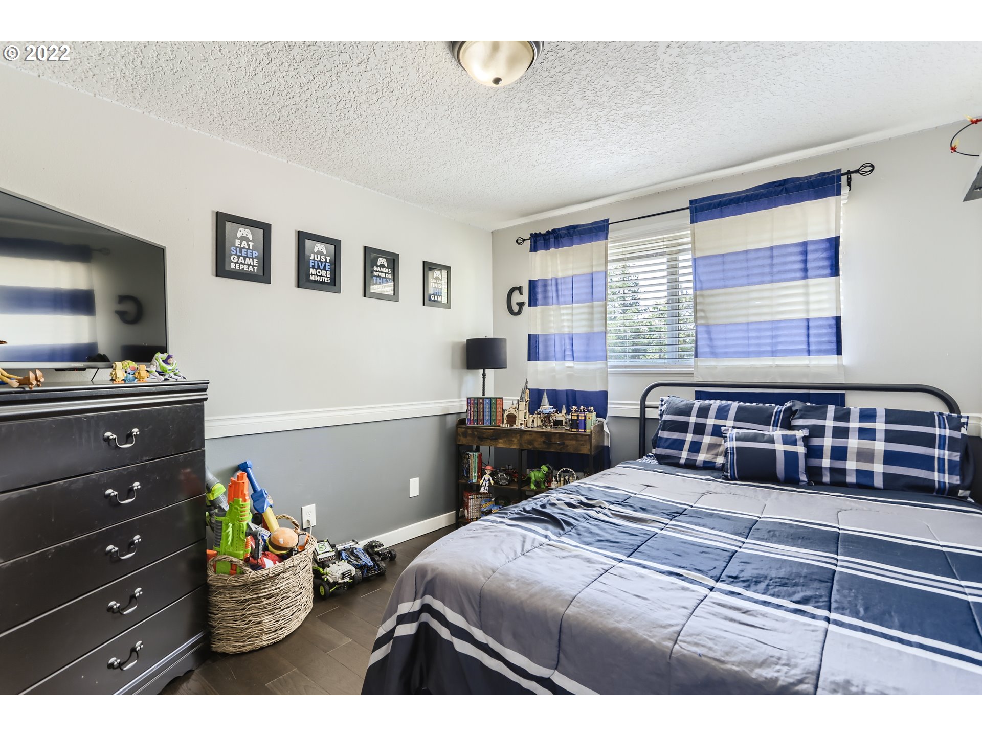 490 Southwest 4th Street Gresham, OR 97080 - Photo 22 of 30 a bedroom with a bed and a window