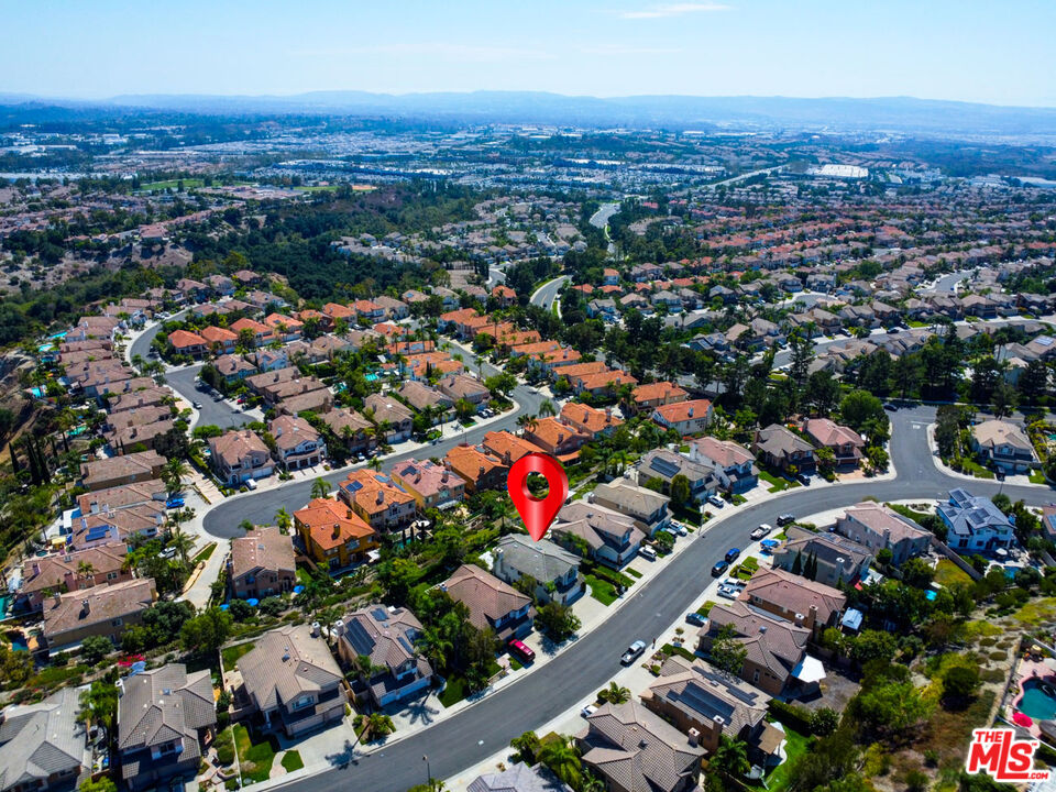 59 La Perla Foothill Ranch, CA 92610 - Photo 8 of 60 an aerial view of residential houses with city view