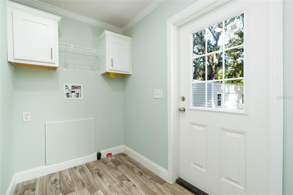 689 Eagle Watch Road Oak Hill, FL 32759 - Photo 24 of 32 a view of an entryway with staircase