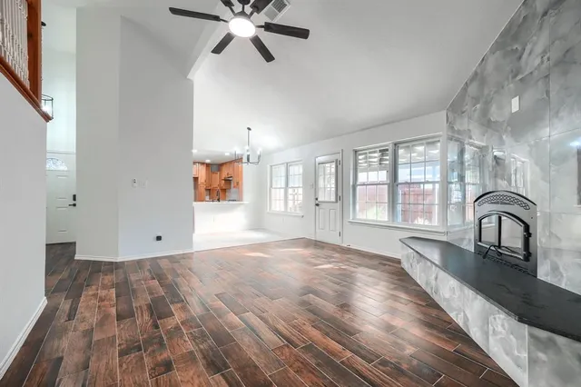 a view of a kitchen with a sink and cabinets