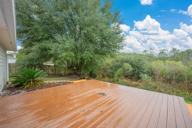 a view of a backyard of the house