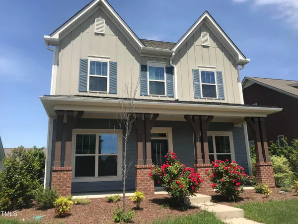 a front view of a house with an outdoor space