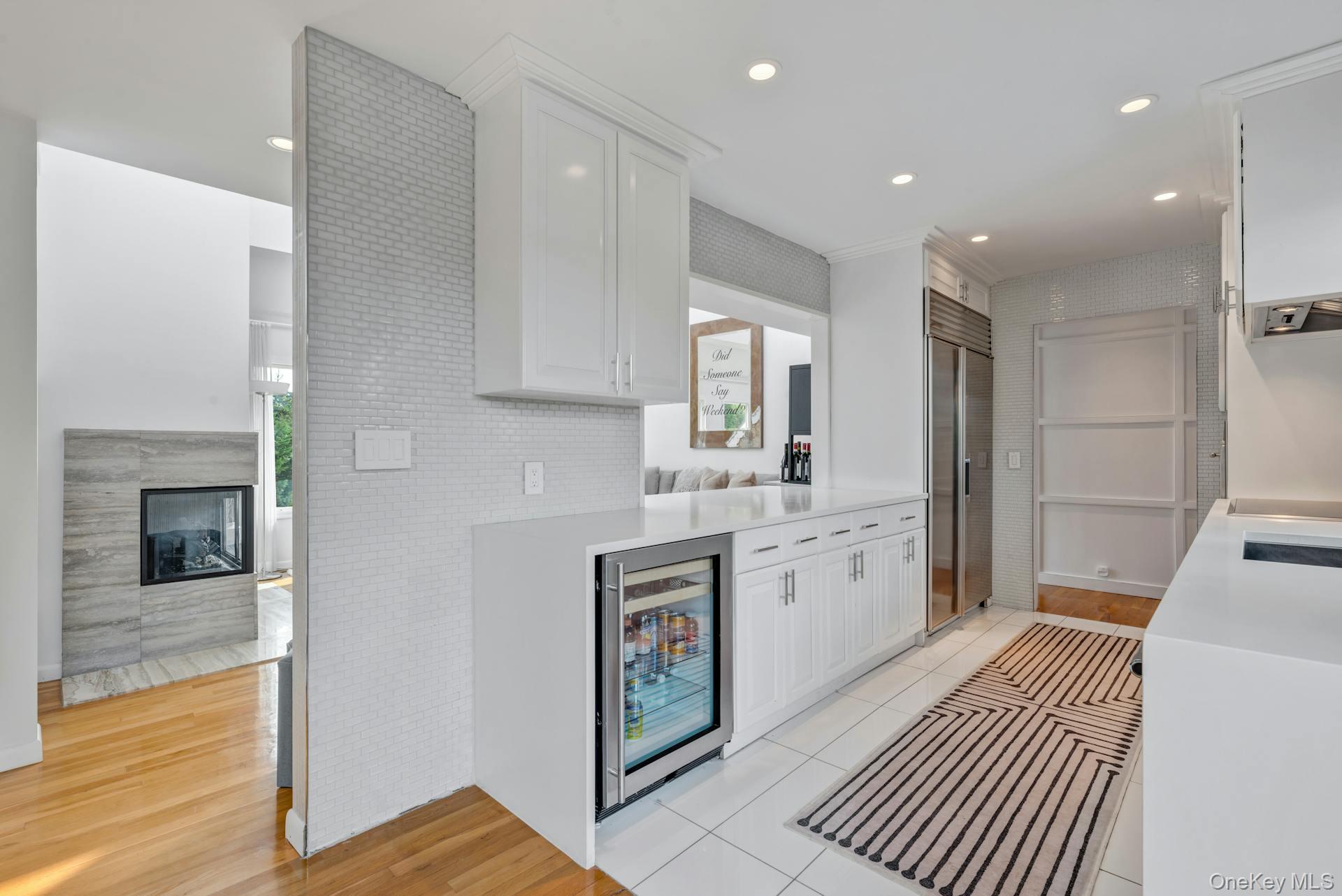 33 Old Canoe Place Road Hampton Bays, NY 11946 - Photo 8 of 28 wine fridge wolf and subzero appliances