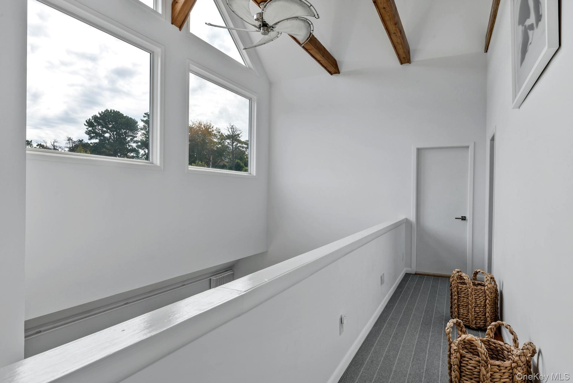33 Old Canoe Place Road Hampton Bays, NY 11946 - Photo 10 of 28 balcony overlooking first floor