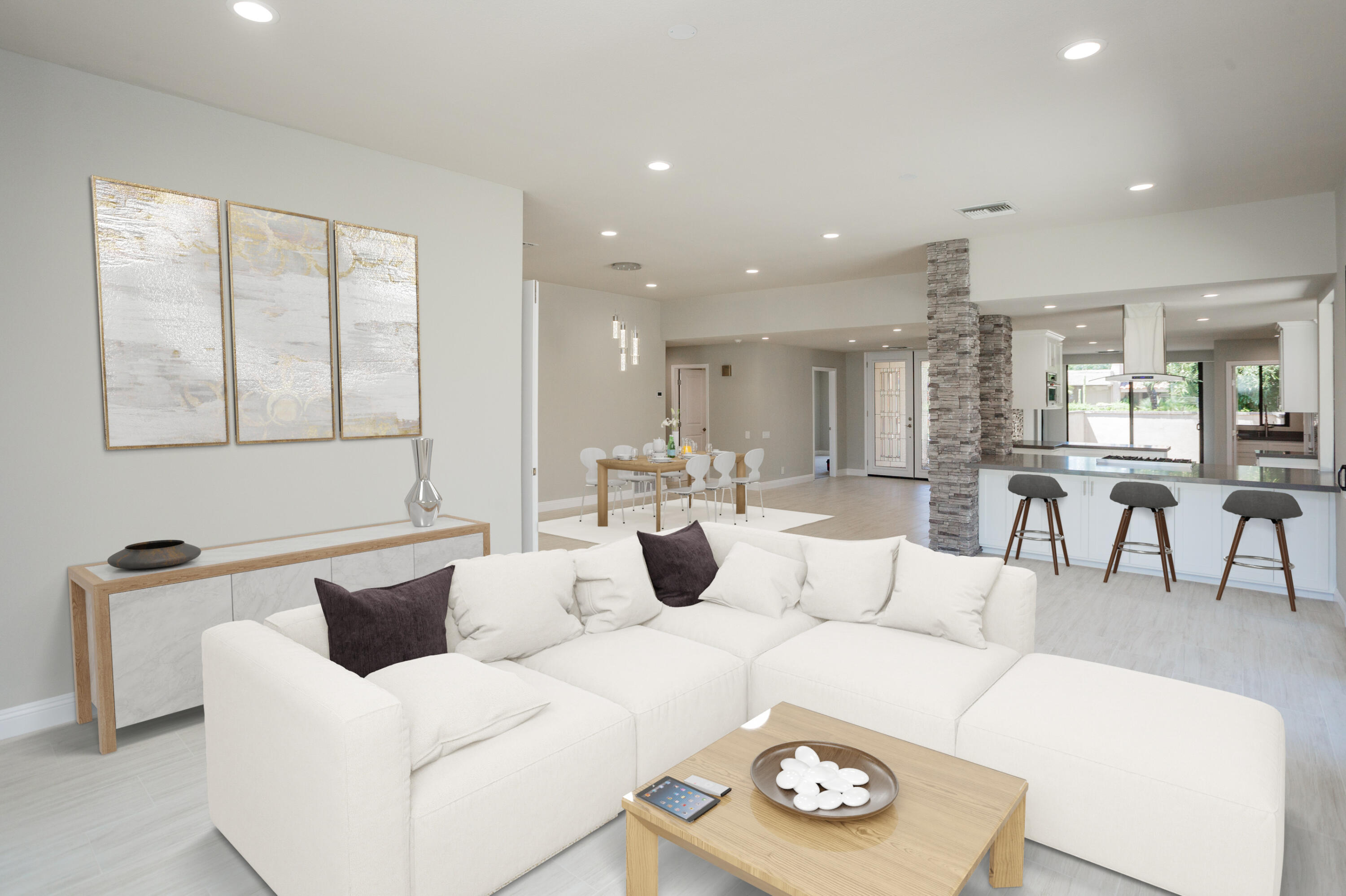 49 Columbia Drive Rancho Mirage, CA 92270 - Photo 14 of 52 a living room with furniture and a table