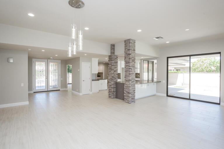 49 Columbia Drive Rancho Mirage, CA 92270 - Photo 18 of 52 a view of an empty room with a kitchen