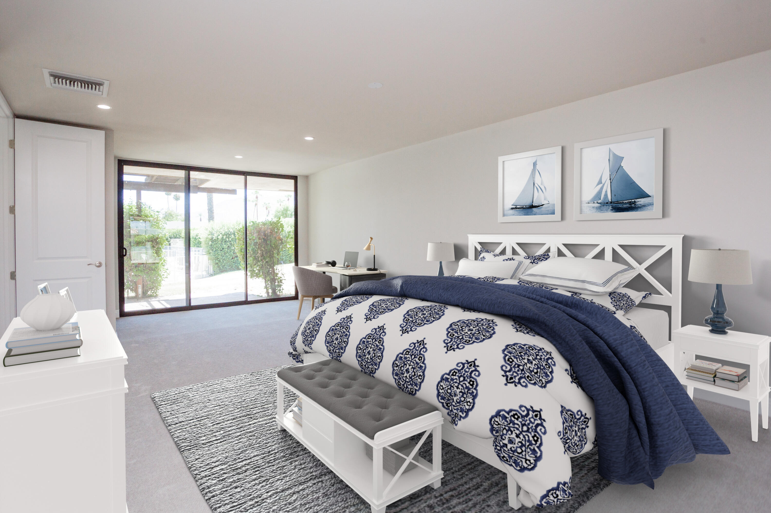 49 Columbia Drive Rancho Mirage, CA 92270 - Photo 19 of 52 a bed sitting in a bedroom next to a window