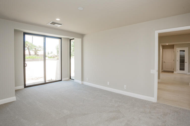49 Columbia Drive Rancho Mirage, CA 92270 - Photo 28 of 52 an empty room with windows