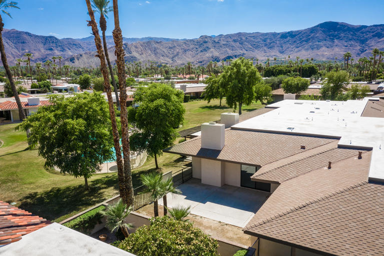 49 Columbia Drive Rancho Mirage, CA 92270 - Photo 35 of 52 an aerial view of a house with a yard