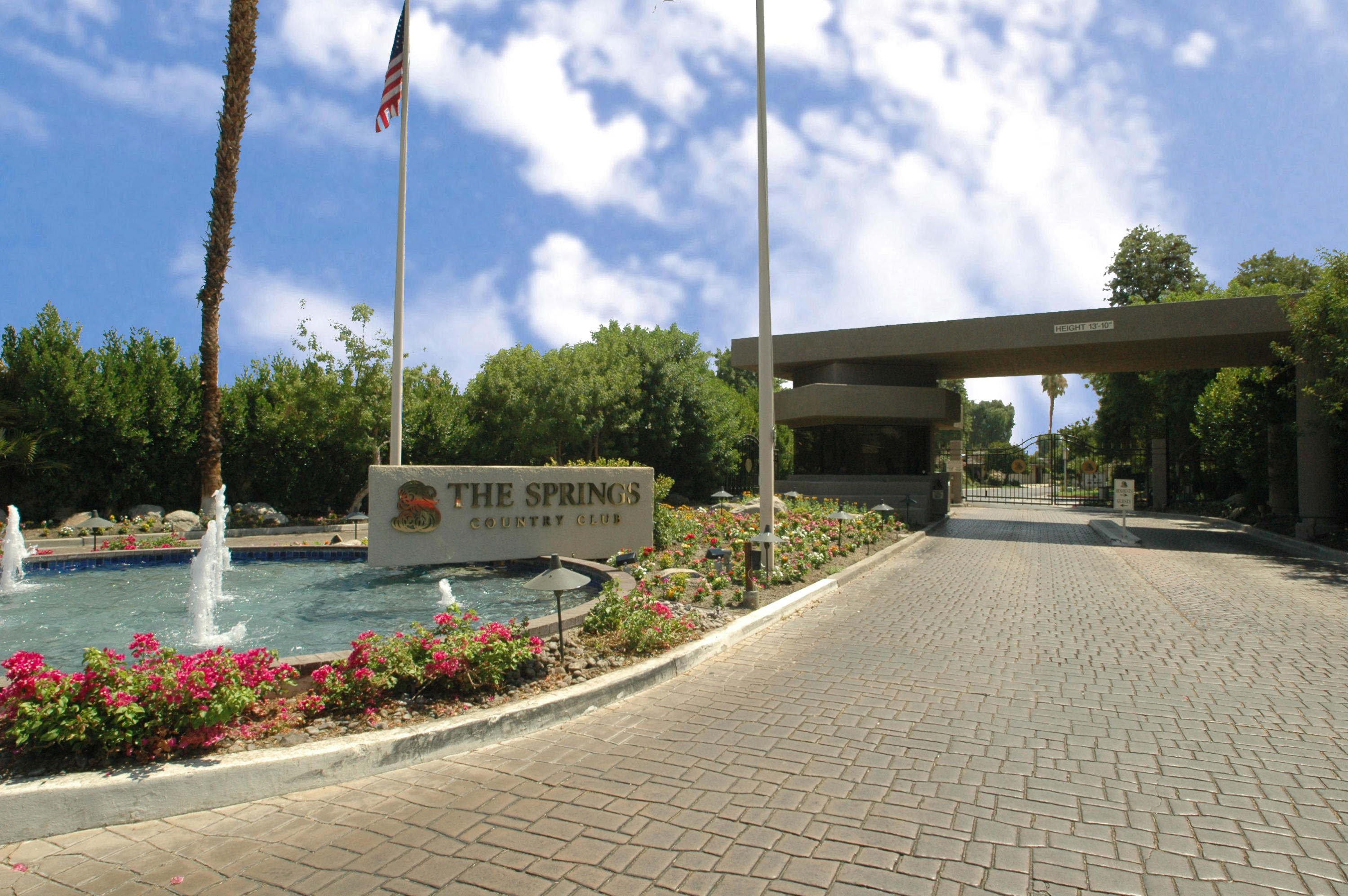 49 Columbia Drive Rancho Mirage, CA 92270 - Photo 40 of 52 a view of a garden with potted plants