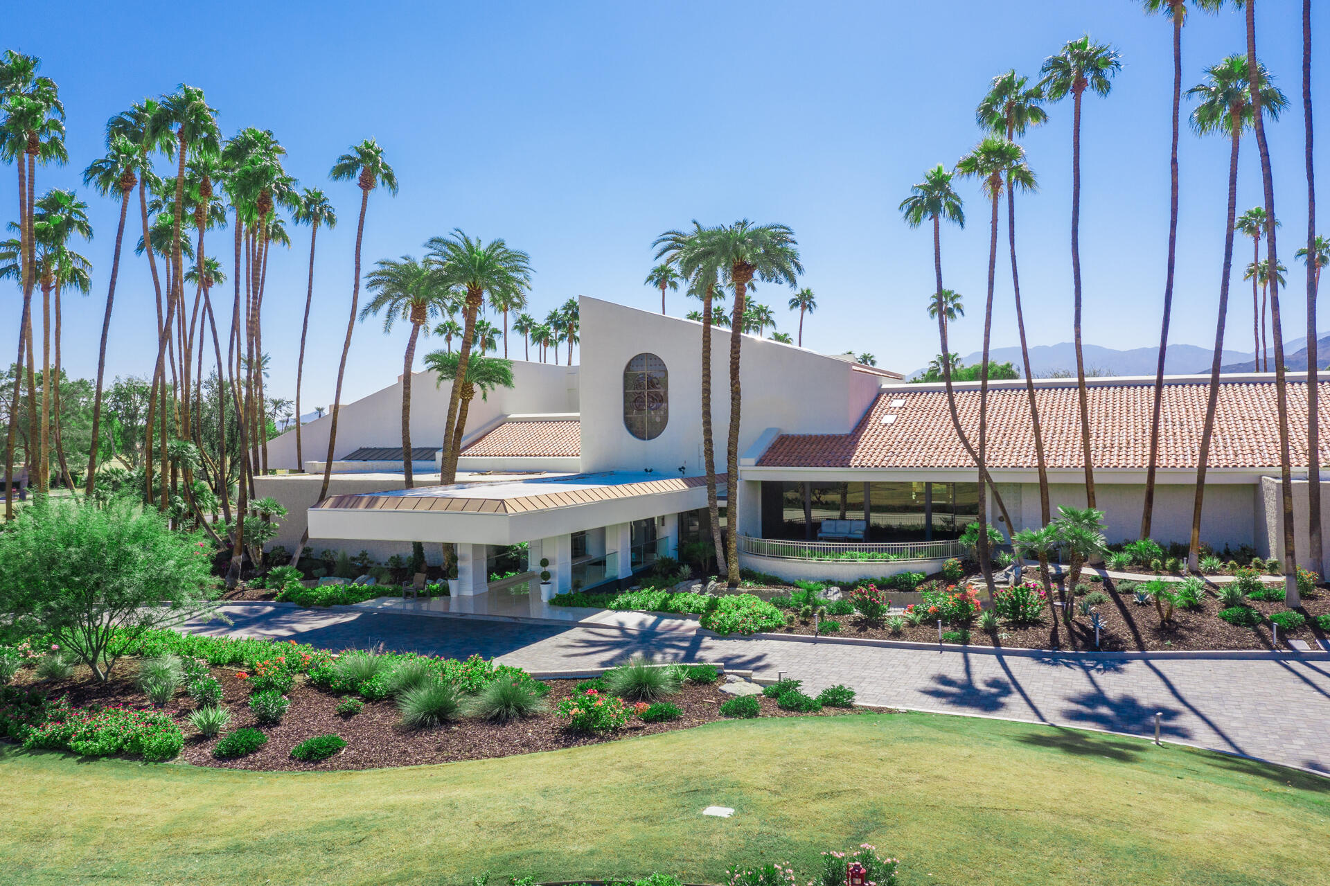 49 Columbia Drive Rancho Mirage, CA 92270 - Photo 42 of 52 a view of a backyard with a patio and plants