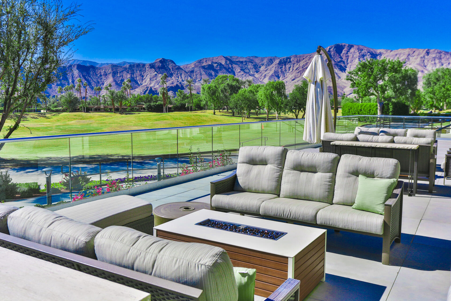 49 Columbia Drive Rancho Mirage, CA 92270 - Photo 45 of 52 a view of a sitting area with furniture in front of house
