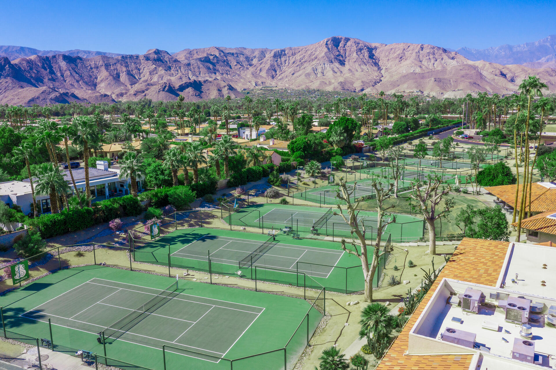 49 Columbia Drive Rancho Mirage, CA 92270 - Photo 49 of 52 an aerial view of a house with a garden and a houses