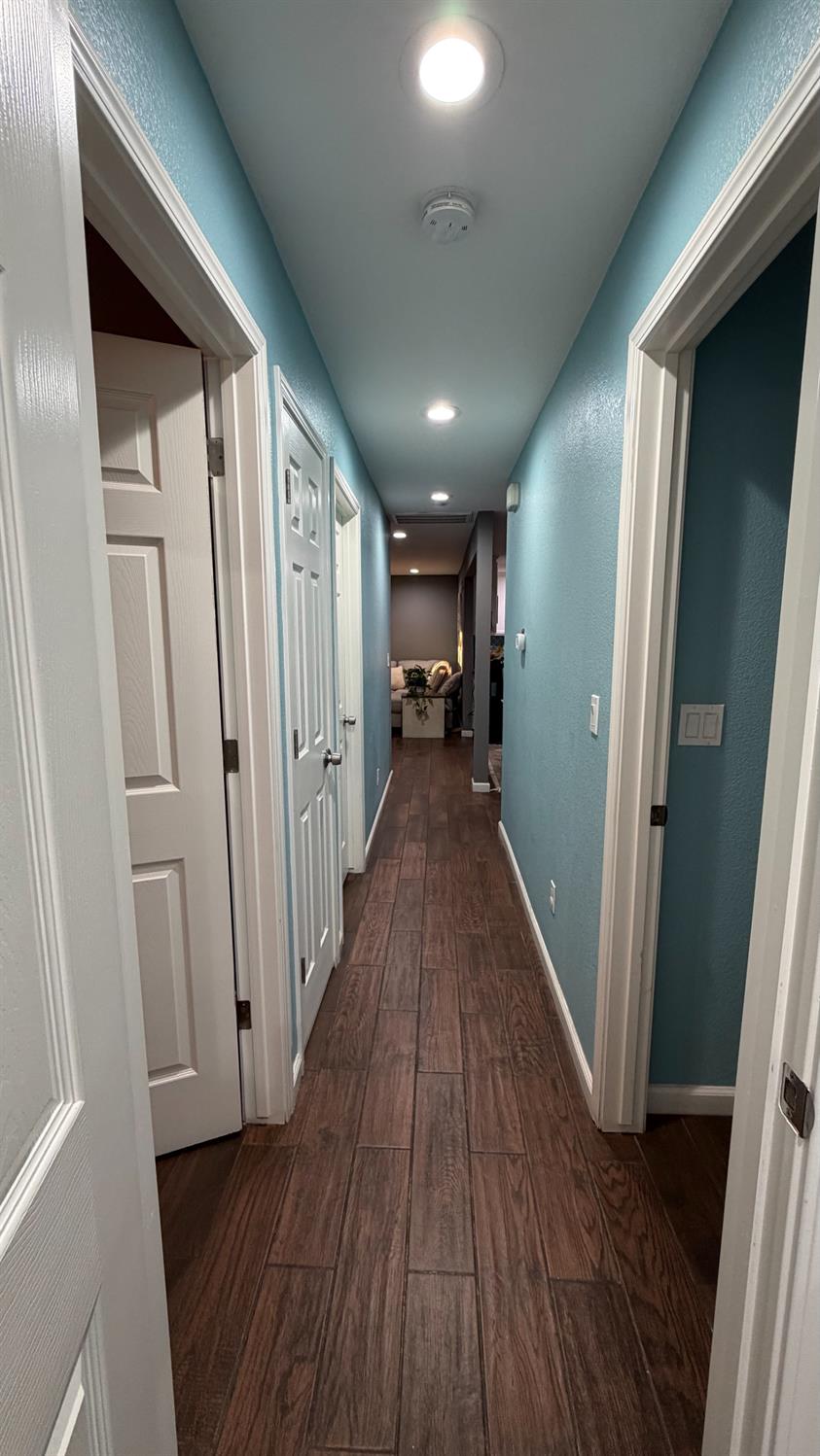 3105 Keller Street Modesto, CA 95355 - Photo 14 of 25 a view of hallway with wooden floor
