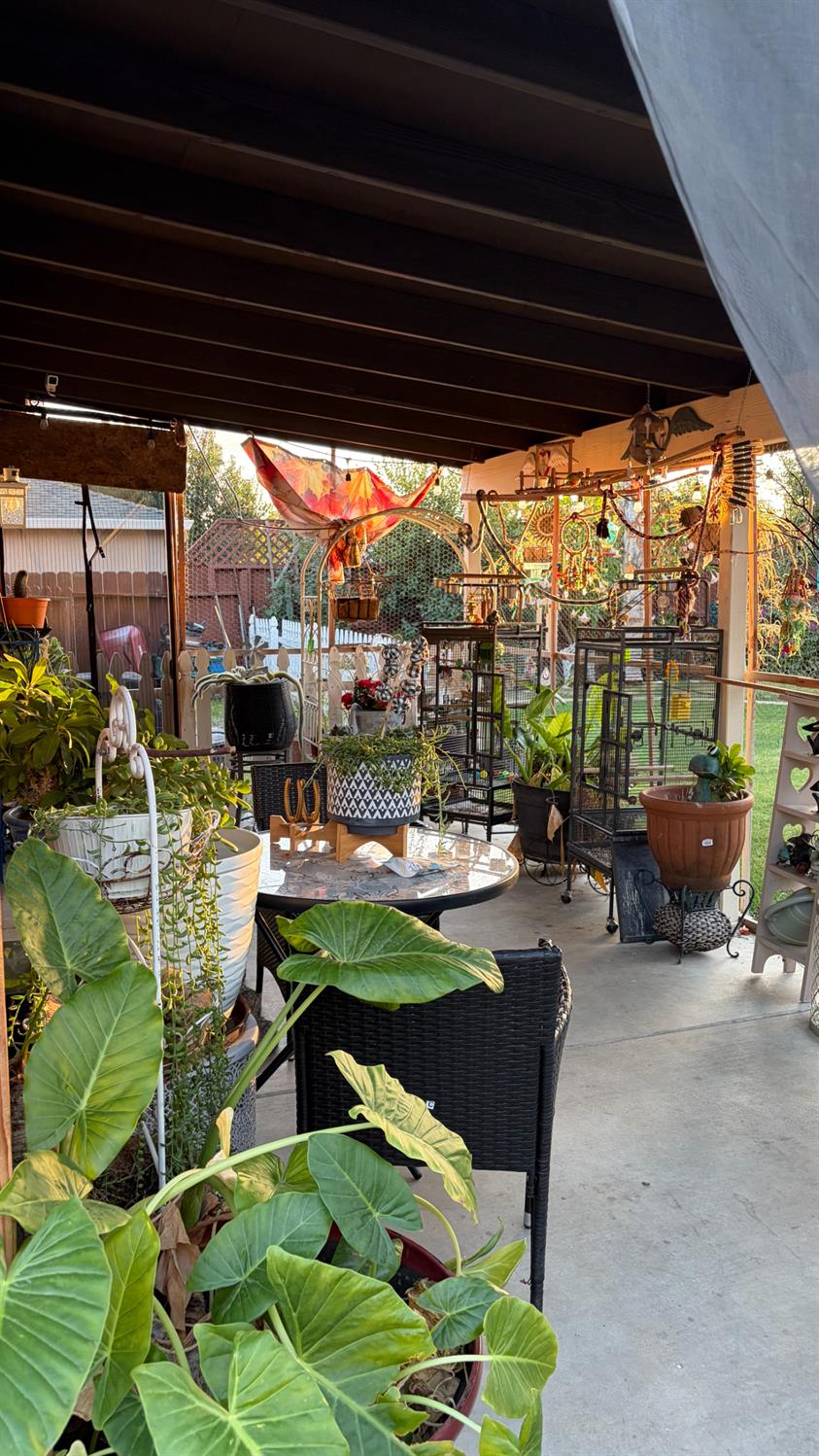 3105 Keller Street Modesto, CA 95355 - Photo 21 of 25 a view of a patio with couches chairs and a table and chairs