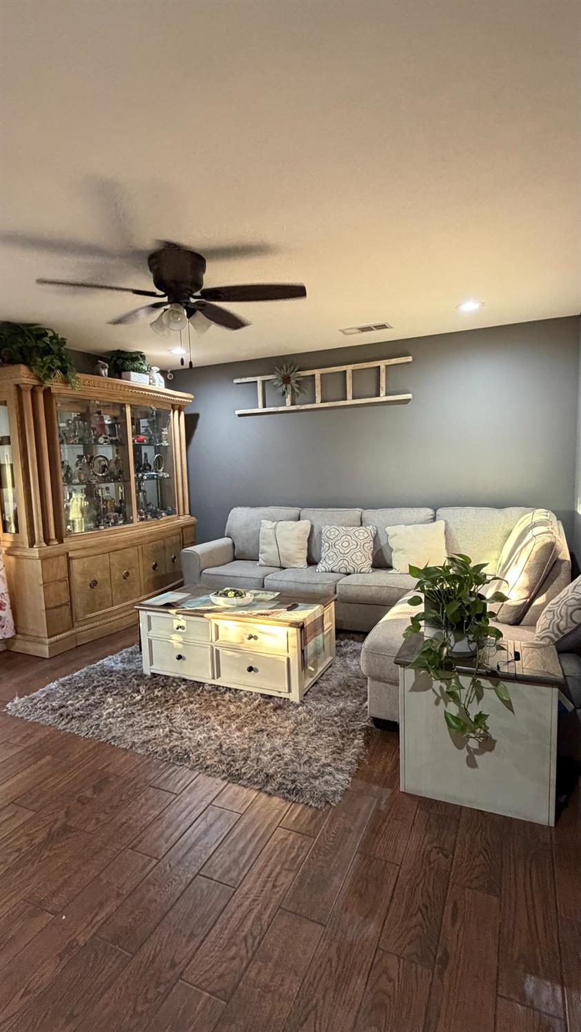 3105 Keller Street Modesto, CA 95355 - Photo 7 of 25 a living room with furniture and a window