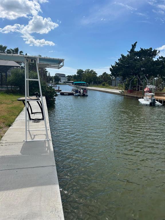 4977 Cedarbrook Lane Hernando Beach, FL 34607 - Photo 20 of 25 a view of a lake