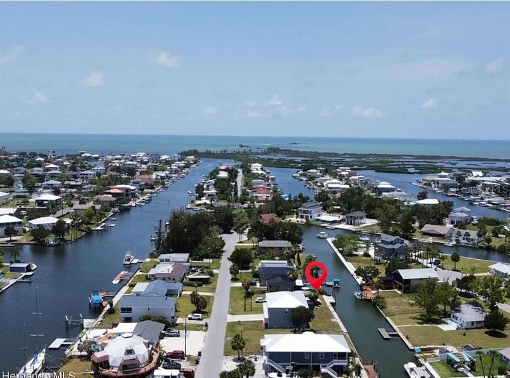 4977 Cedarbrook Lane Hernando Beach, FL 34607 - Photo 2 of 25 an aerial view of a city