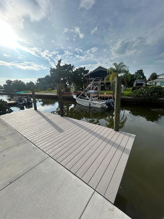 4977 Cedarbrook Lane Hernando Beach, FL 34607 - Photo 23 of 25 a view of a terrace with sitting area